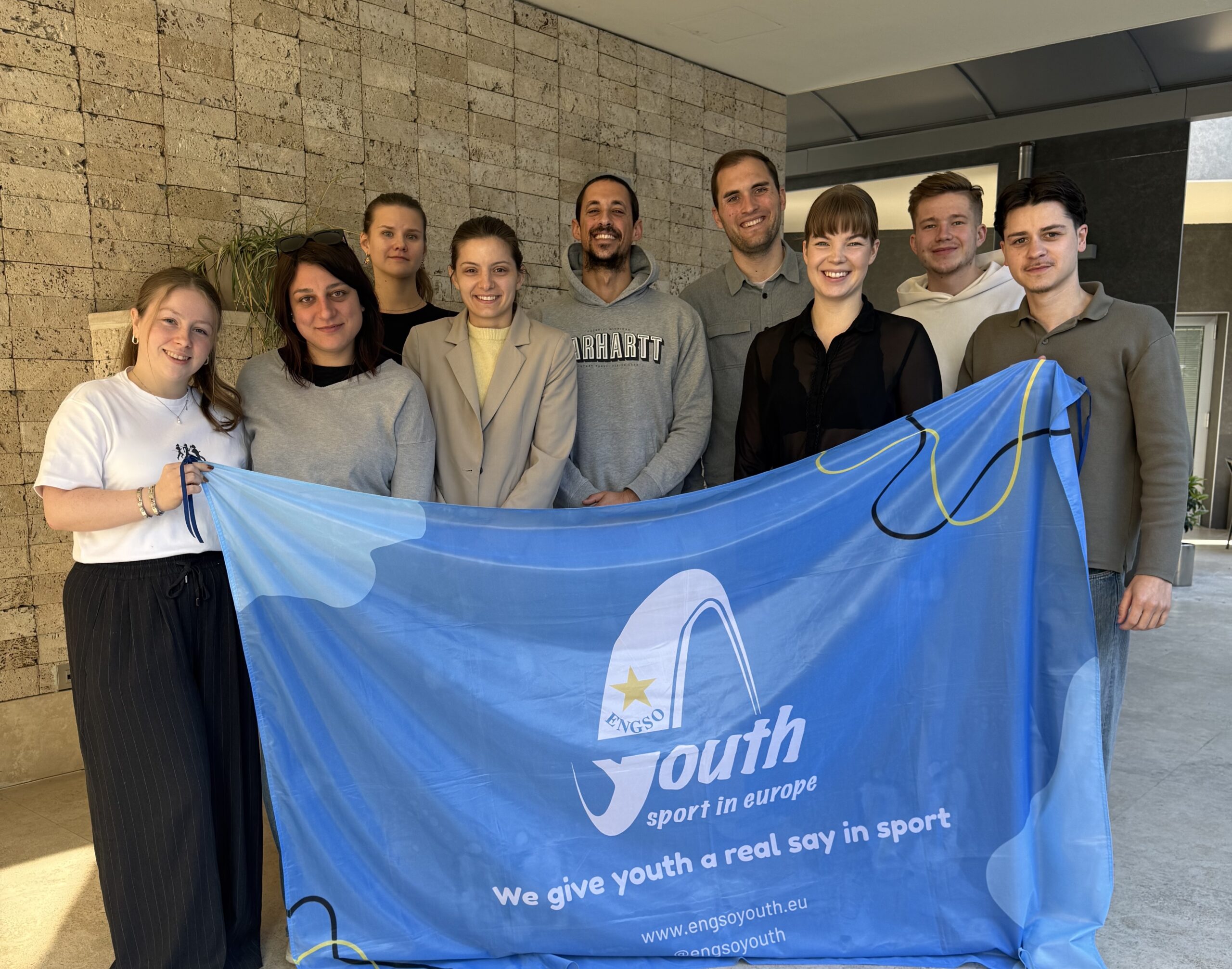 Group photo with flag